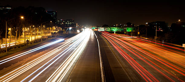 istock cars driving on the freeway at night long exposure 177234253