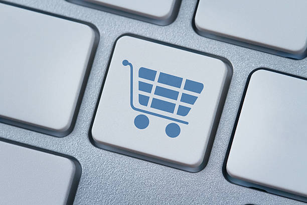 istock Shopping cart icon at the computer key 177235137