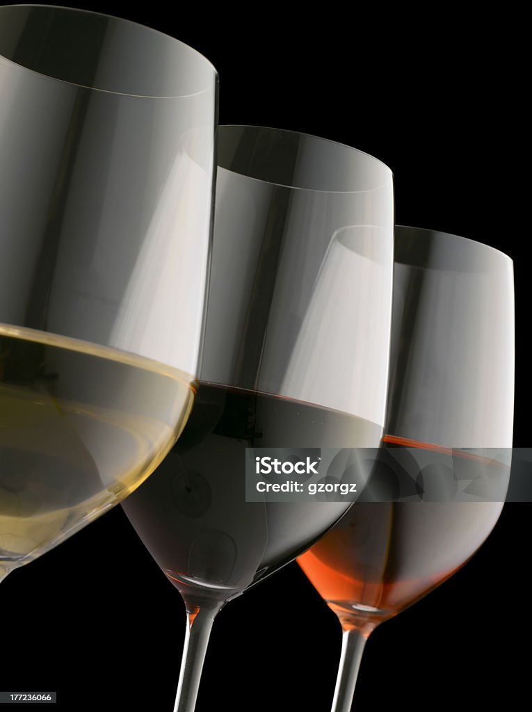 Different wines "Glasses of red, white and rose wine on black background (Shallow focus. Focus on red wine)" Red Stock Photo