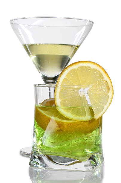 Coctail in cup and glasses lime