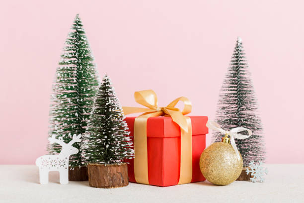 istock Christmas composition. craft Gift box, small tree, branches and craft DIY decorations on white background. New year concept. Christmas home decoration Flat lay, top view, copy space 1772365336