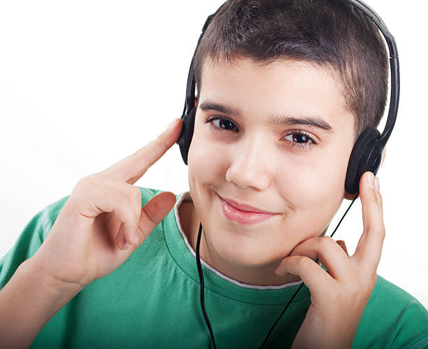 boy with headphones stock photo