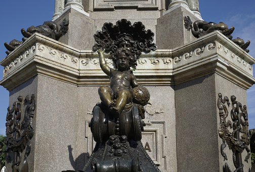 London, United Kingdom - Sep 7, 2021: Lion statue guarding Nelson's Column, Trafalgar Square, London