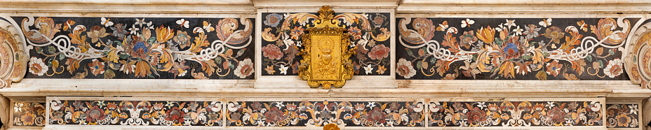 Naples - The tabernacle and the stone mosaic (Pietra dura) on the baroque altar in the church  Chiesa di Sant'Anna dei Lombardi by unknown baroque artist.