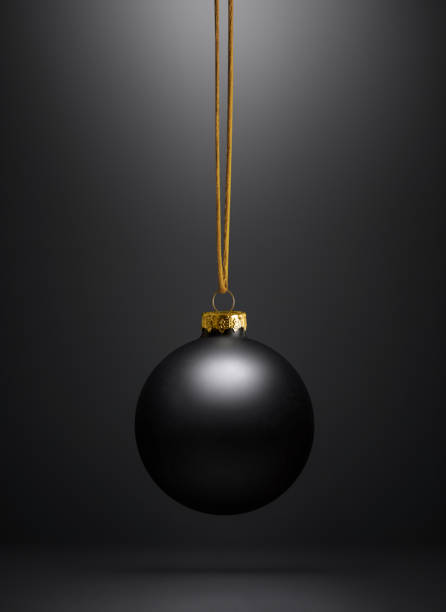 istock Black Christmas Bauble against a Black Background 1772379235