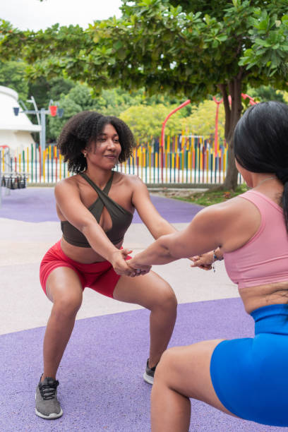 istock Two women stretching before jogging in the city 1772381095