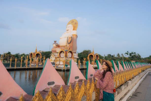 istock Woman in straw hat in thai temple on Koh Samui 1772381680