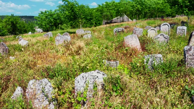 Abandoned old Jewish cemetery on the edge of the hill