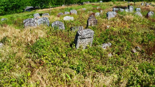 Abandoned old Jewish cemetery on the edge of the hill