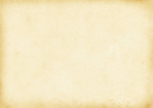 Aged and yellowed parchment background stock photo