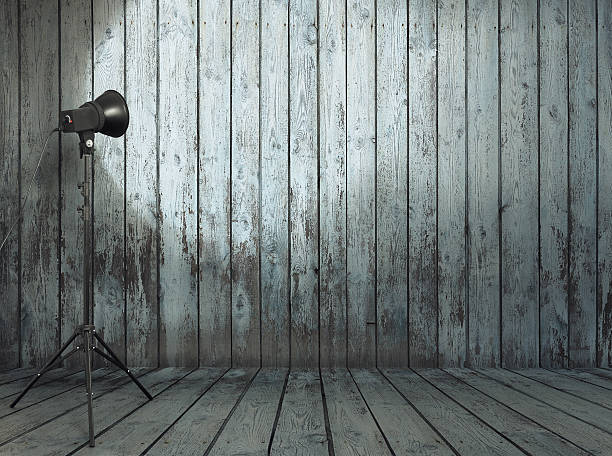 istock Studio light shining in old wooden room 177239224