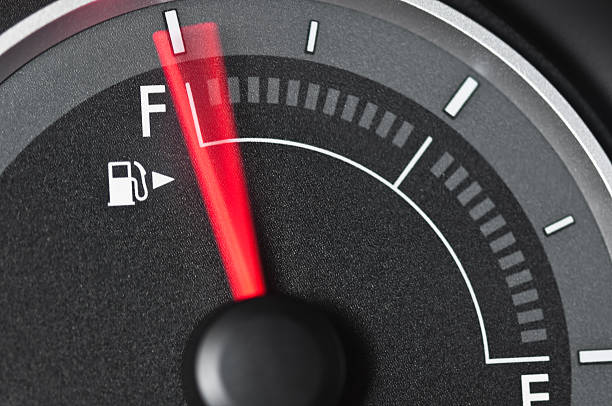 Fuel Gauge with motion blurred needle stock photo