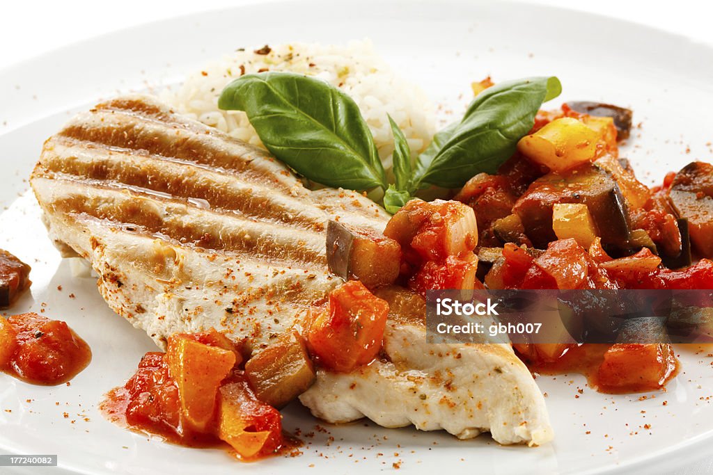 Grilled meat and vegetables Grilled chicken fillets and vegetables More ... Basil Stock Photo