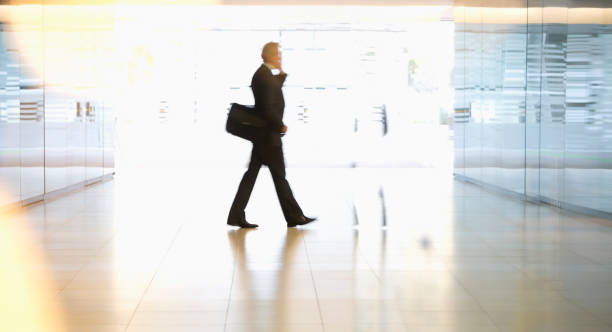 istock Businessman walking in lobby 177240399