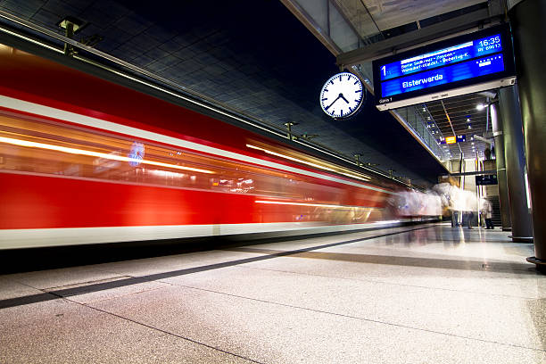 istock Railroad Station platform with departing Train 177240759