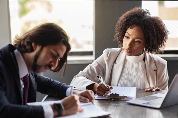 istock Attractive black lady secretary taking instructions from boss 1772413146