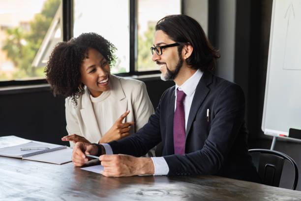 istock Happy multiracial businesspeople have conversation during work meeting, office interior 1772413159