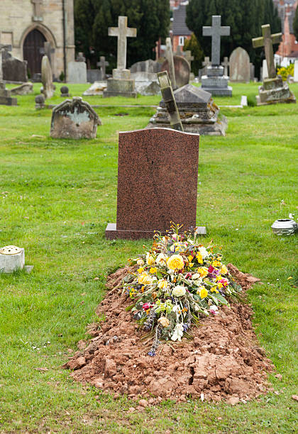 istock Freshly dug grave in cemetery 177241600