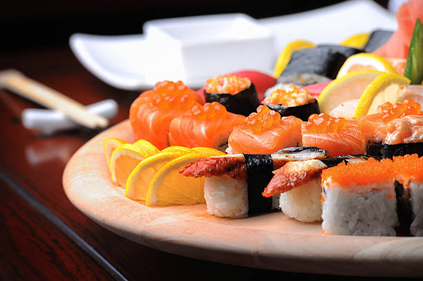 istock Sushi on a wooden plate with chopsticks 177241718