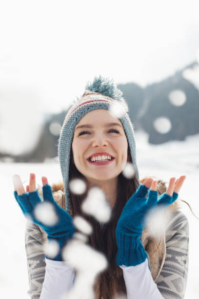Photo of adorable impressed schoolgirl wear windbreaker jacket enjoying snowfall weather countryside forest.
