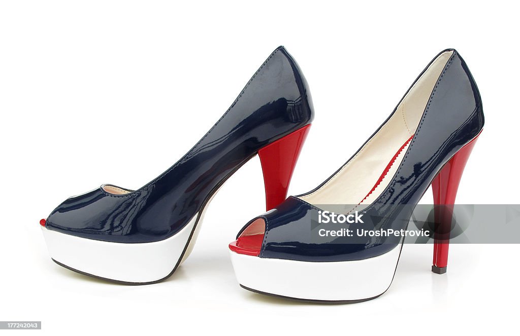 Navy blue white red high heels open toe pump shoes Here are fancy navy blue white red high heels open toe pump shoes. Beauty Stock Photo