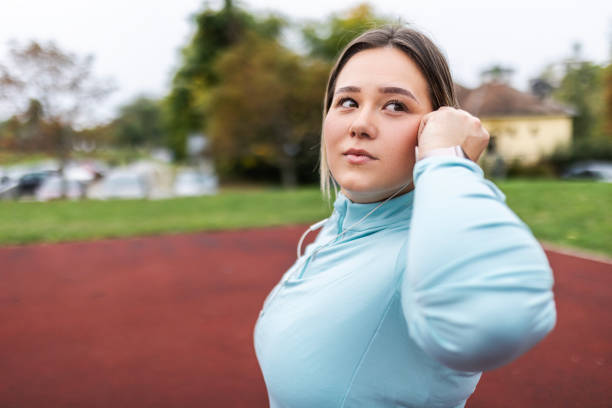 istock Young Woman Enjoys Music During Her Break 1772428243