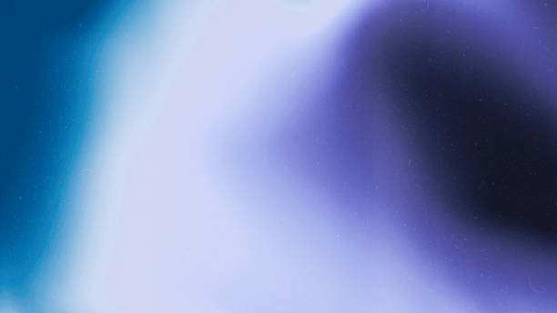 istock Blue, white and purple colors on gradient grainy background. 1772428253