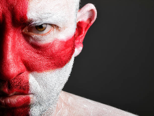 istock Half of man's face with white and red paint 177242977