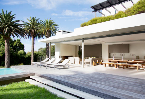 istock Lounge chairs on deck of modern house 177243220