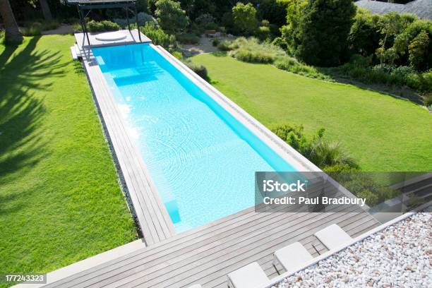 Sun Shining On Luxury Lap Pool Stock Photo - Download Image Now - Lap Pool, Absence, Architecture