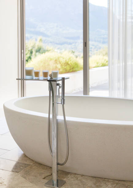istock Candles near bathtub in modern bathroom 177243691