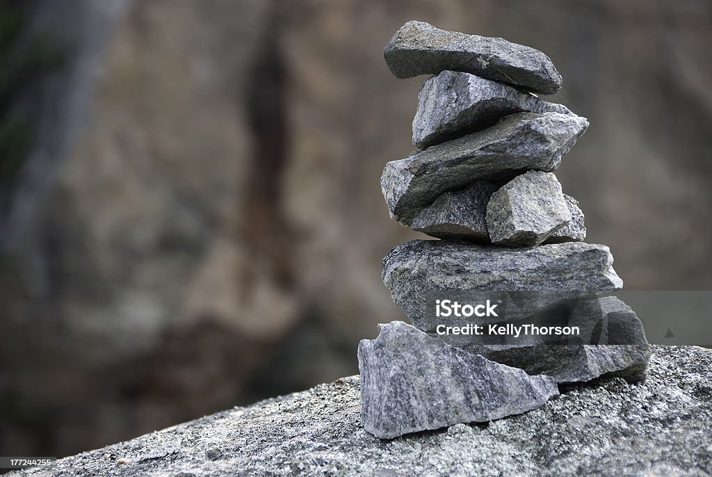 inukshuk "Inukshuk in Kenora Ontario, used as a directional marking or a symbol of a persons presence in a place." Kenora Stock Photo