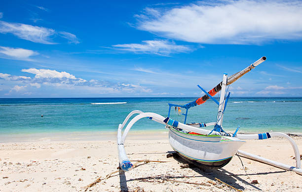 Fisherman boat on beach  Gili island,  Indonesia "Fisherman boat on beach  Gili island, Trawangan, Indonesia" gili trawangan stock pictures, royalty-free photos & images