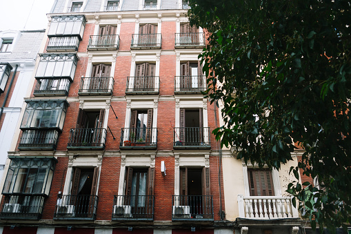 Facade of an apartment building in Madrid, Spain