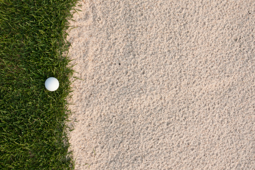 Golf ball  and sand bunker
