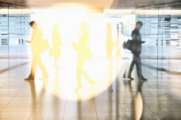 istock Business people walking in lobby 177245423