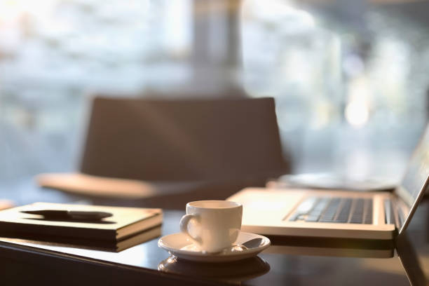 istock Coffee cup, laptop, notebook and pen in office 177245735