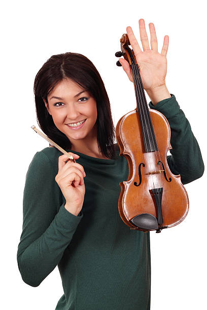 istock beautiful girl with violin posing 177245876