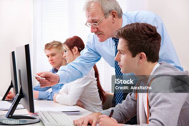 Computer Training Stock Photo - Download Image Now - Adolescence, Adult, Assistance