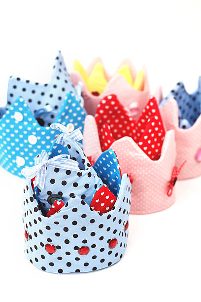 Several polka dot textile crowns stock photo