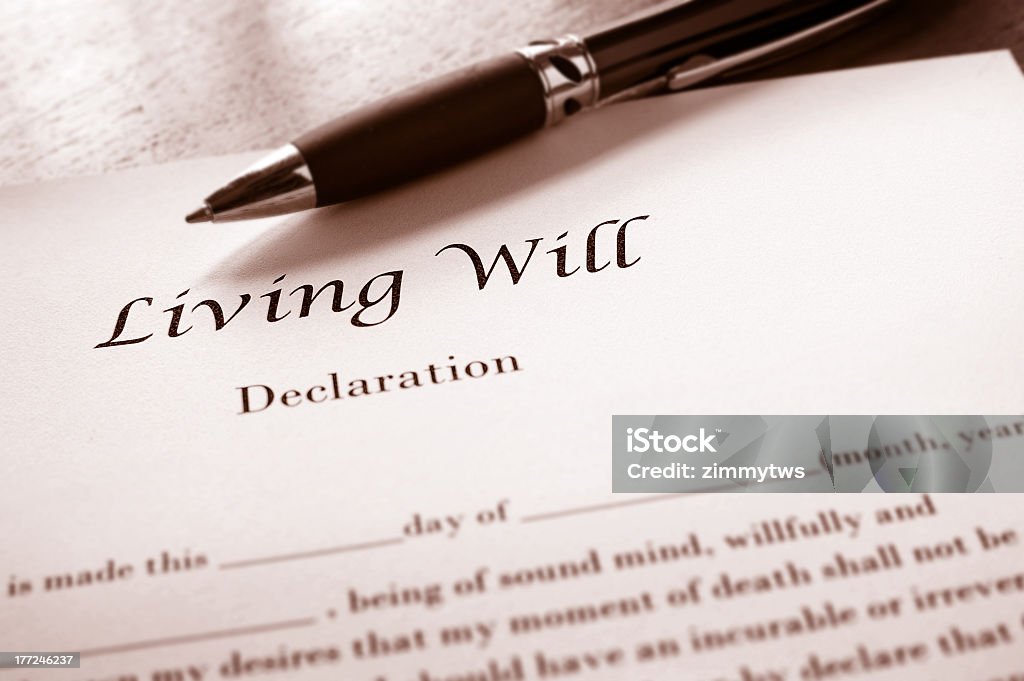 Close-up of the title of a living will Closeup of a Living Will document and pen Concepts Stock Photo