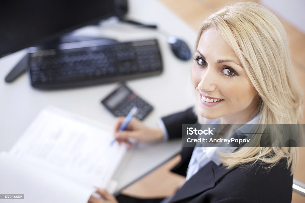 Beautiful businesswoman doing finances Financial Advisor Stock Photo