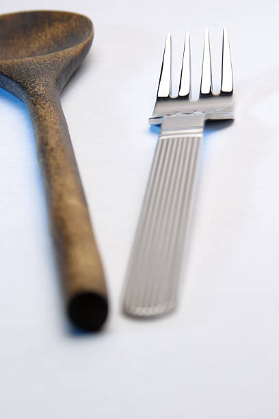 istock steel fork and wood spoon 177246947