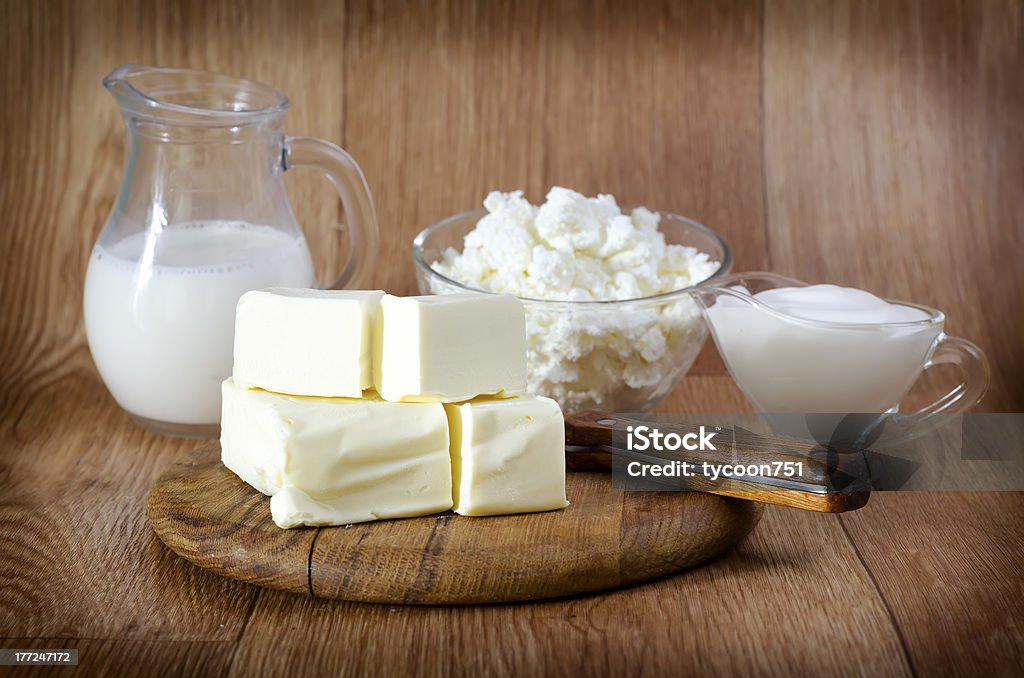 dairy products dairy products on wooden table Bowl Stock Photo