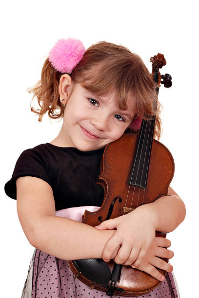 istock little girl with violin portrait 177247791