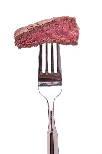 istock Roasted rare fillet of beef on a fork 177247998