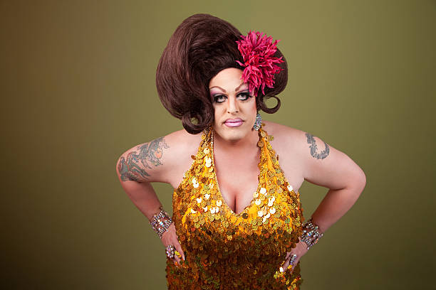 Serious Drag Queen Serious large drag queen with hands on hips unknown gender stock pictures, royalty-free photos & images