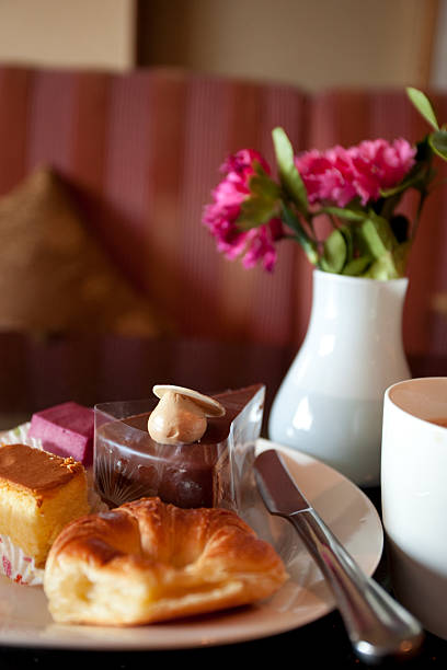 istock breakfast with bread and cup of black coffee, croissants 177248258
