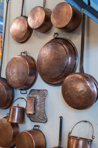 istock Copper Pots and Pans and other Kitchen Utensils in an Antique Kitchen. 1772485146