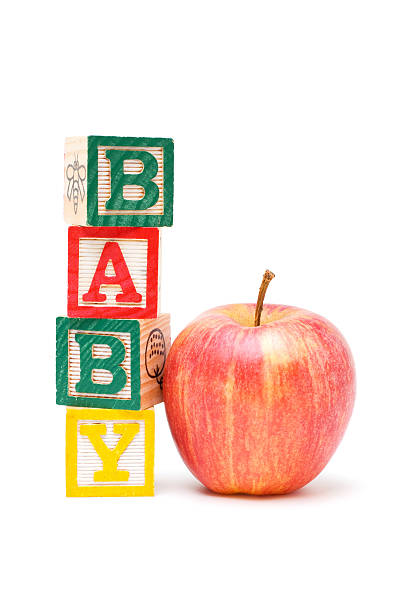 istock Wooden blocks and apple with baby 177249100
